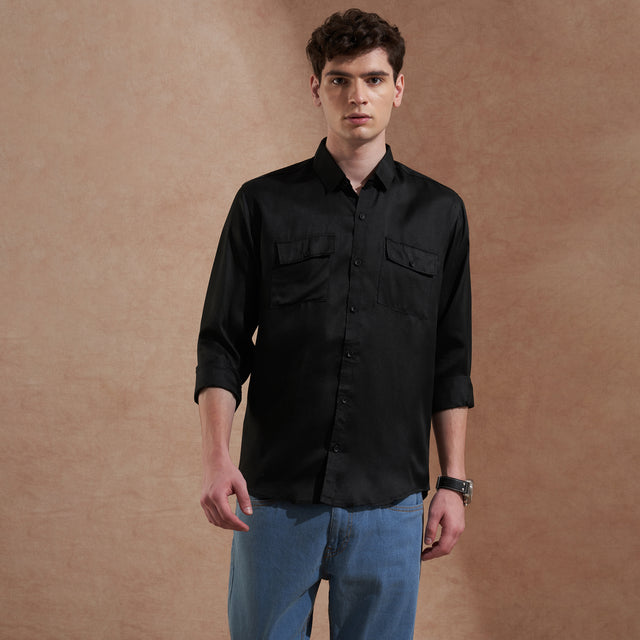Men's black solid slim-fit shirt with dual flap pockets, product view