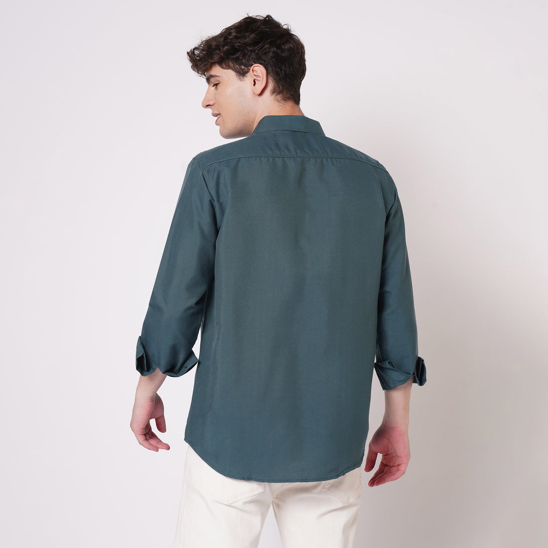 Men's teal green solid shirt back view