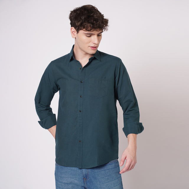 Men's deep teal solid shirt front styling view