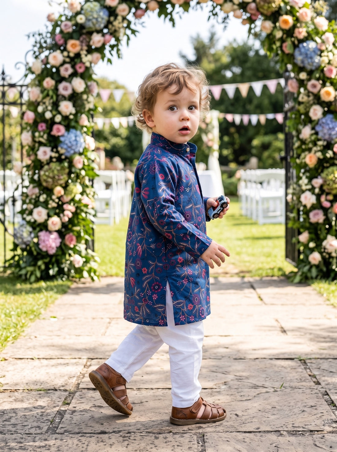 TRYBUY boys navy floral kurta with white pyjamas, side walking view showing the straight silhouette
