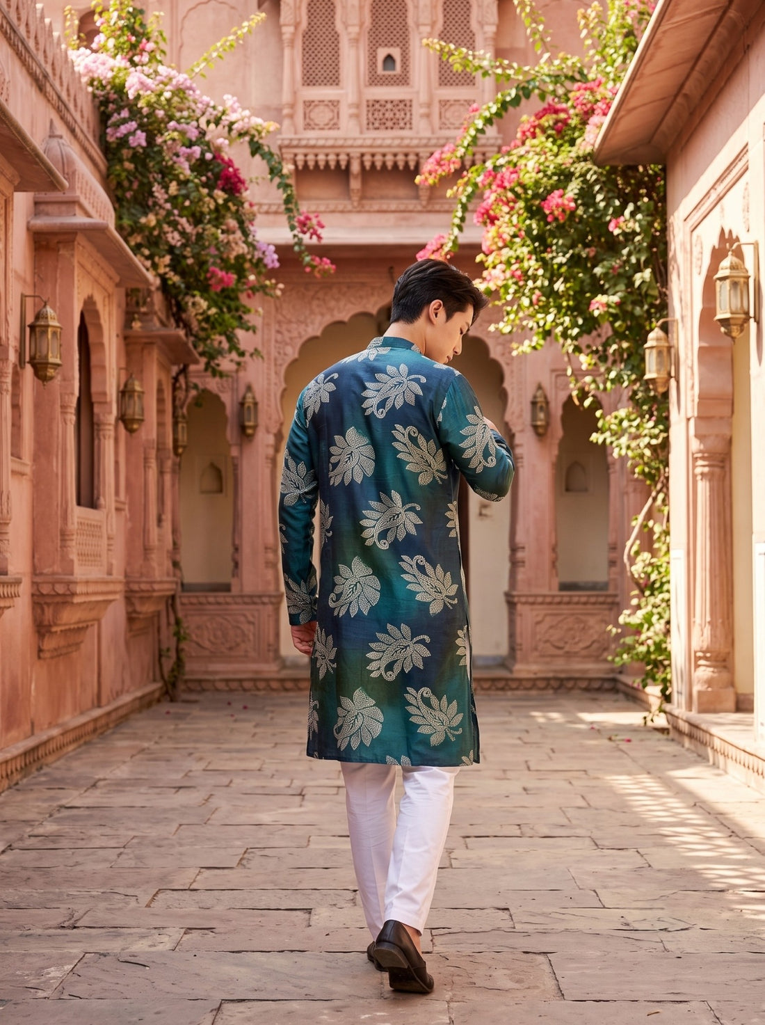 Back view of TryBuy TB_21145 men's emerald teal green botanical print kurta showing the all-over beige leaf pattern, full sleeves and long silhouette.
