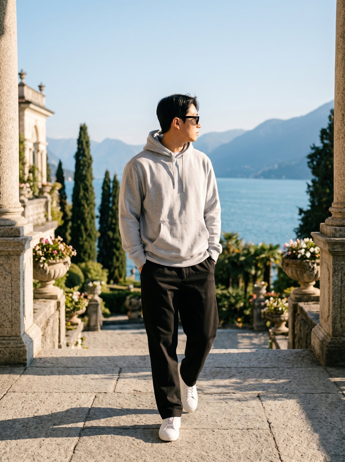 
Men's light grey cotton pullover hoodie, full-length front lifestyle view
