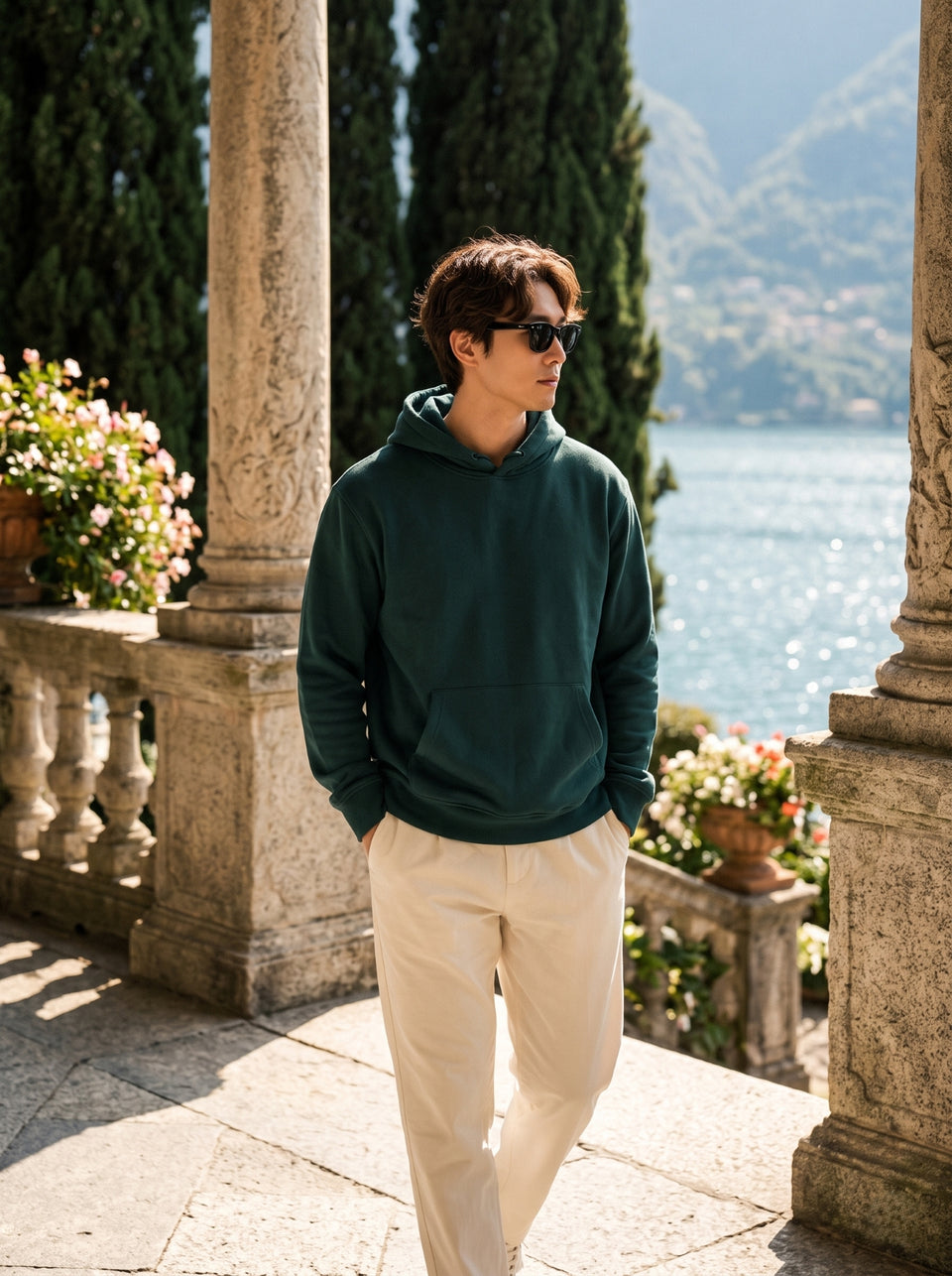 
Men's forest green cotton pullover hoodie, full-length front lifestyle view

