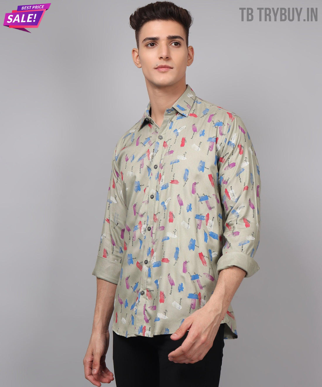 
a man wearing a shirt with a colorful pattern on it
