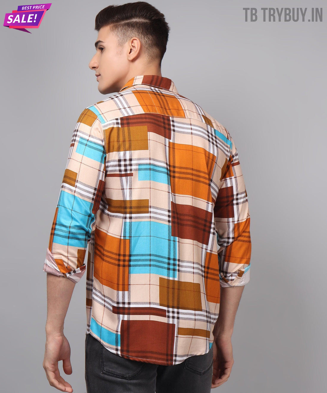 
a man wearing a multicolored plaid shirt
