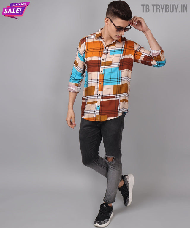 
a man wearing a plaid shirt and black jeans
