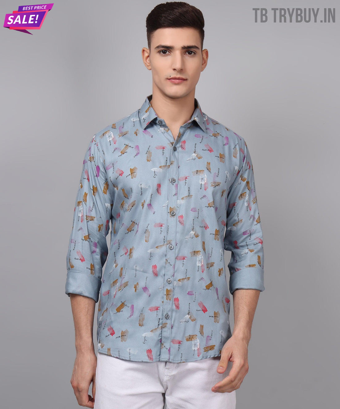 
a man wearing a blue shirt with a pattern on it
