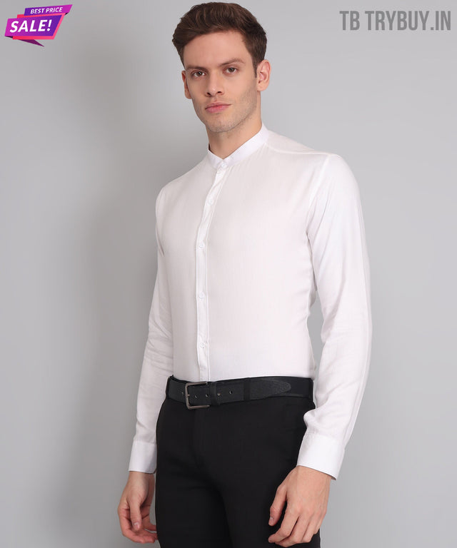 
a man wearing a white shirt and black pants
