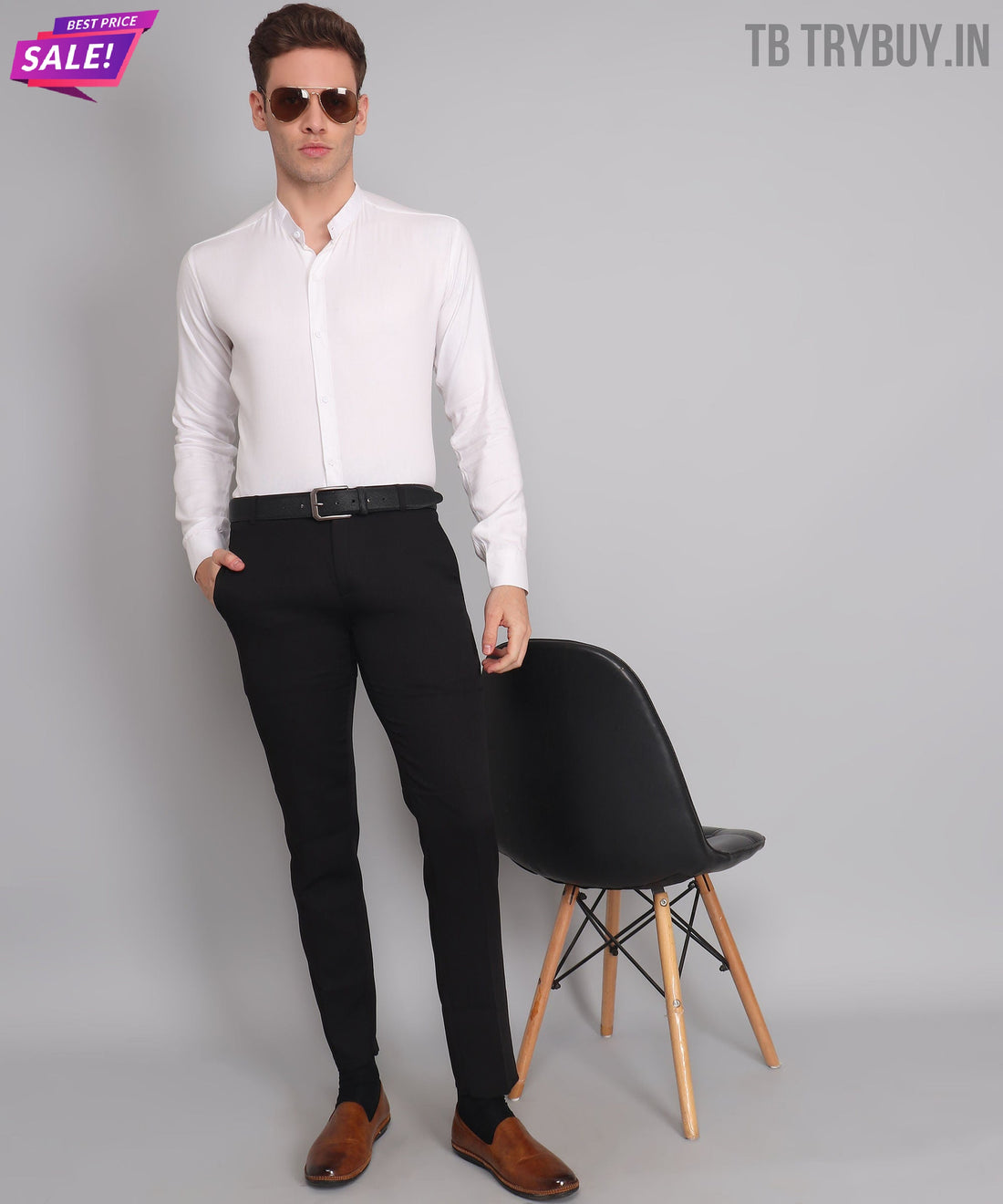 
a man in a white shirt and black pants
