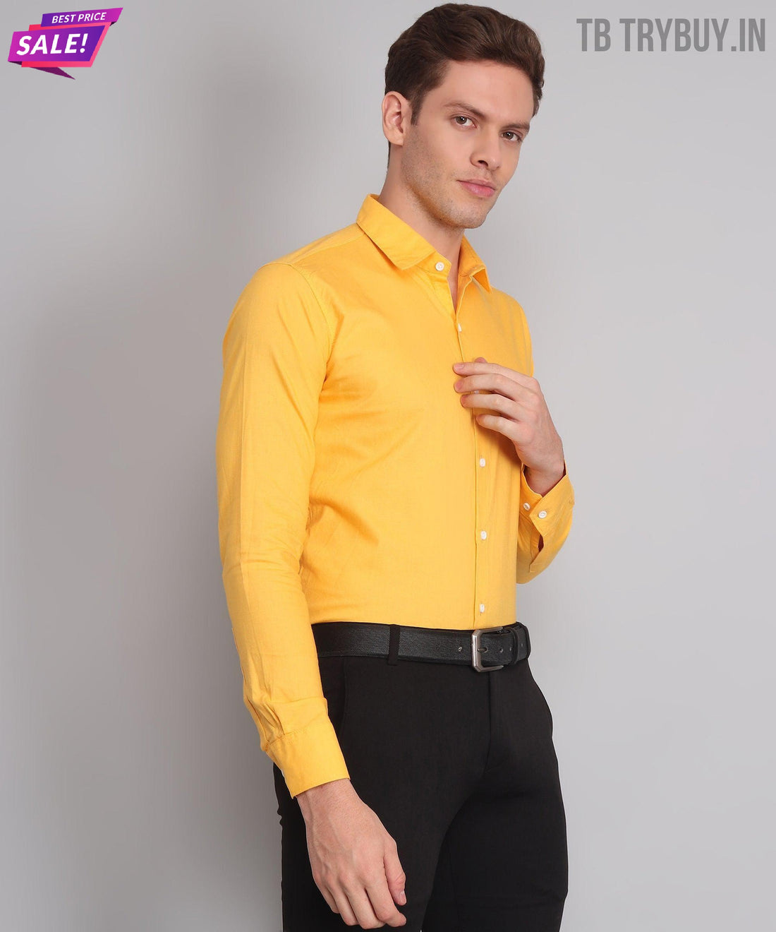 
a man wearing a yellow shirt and black pants
