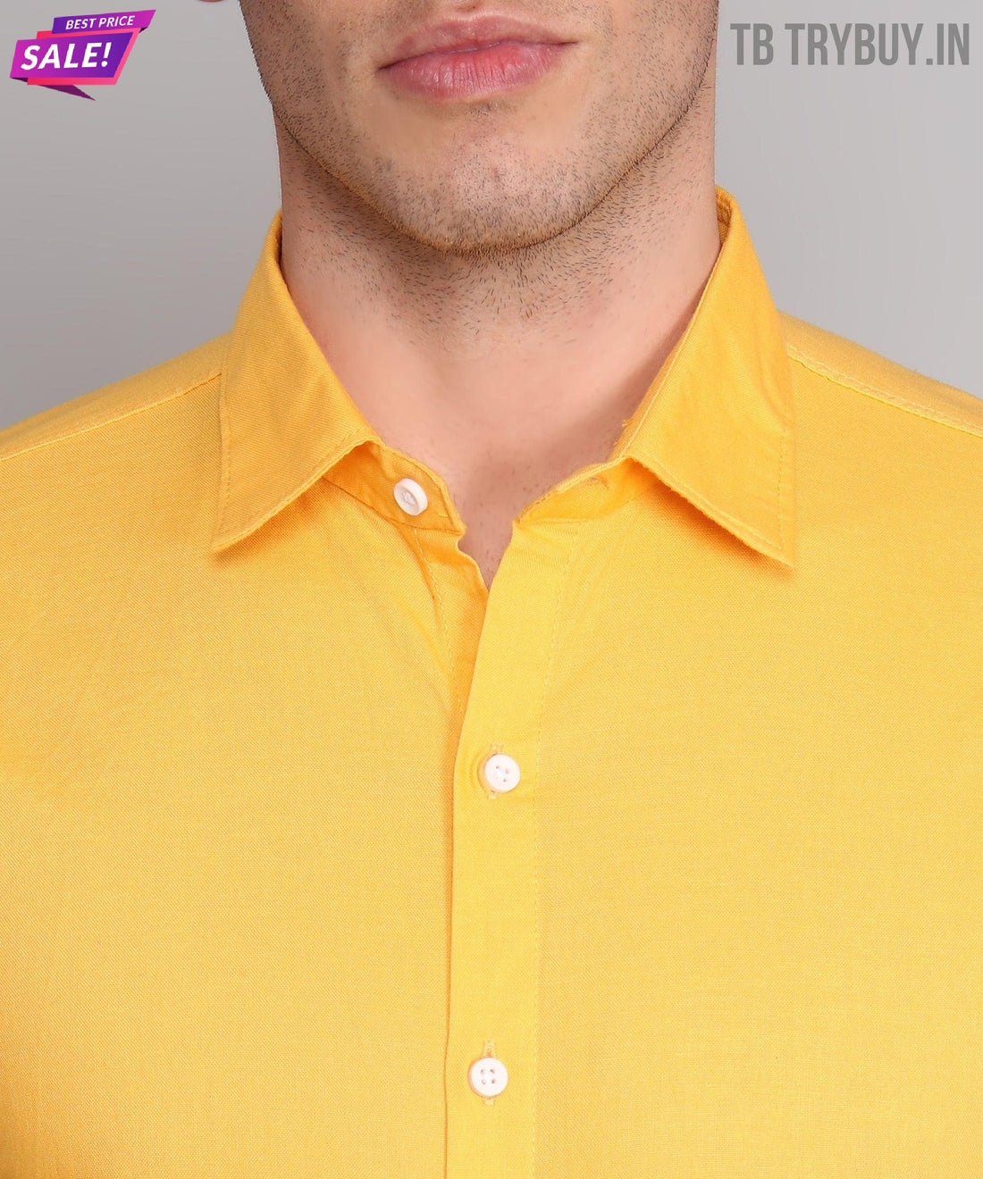 
a man wearing a yellow shirt and glasses

